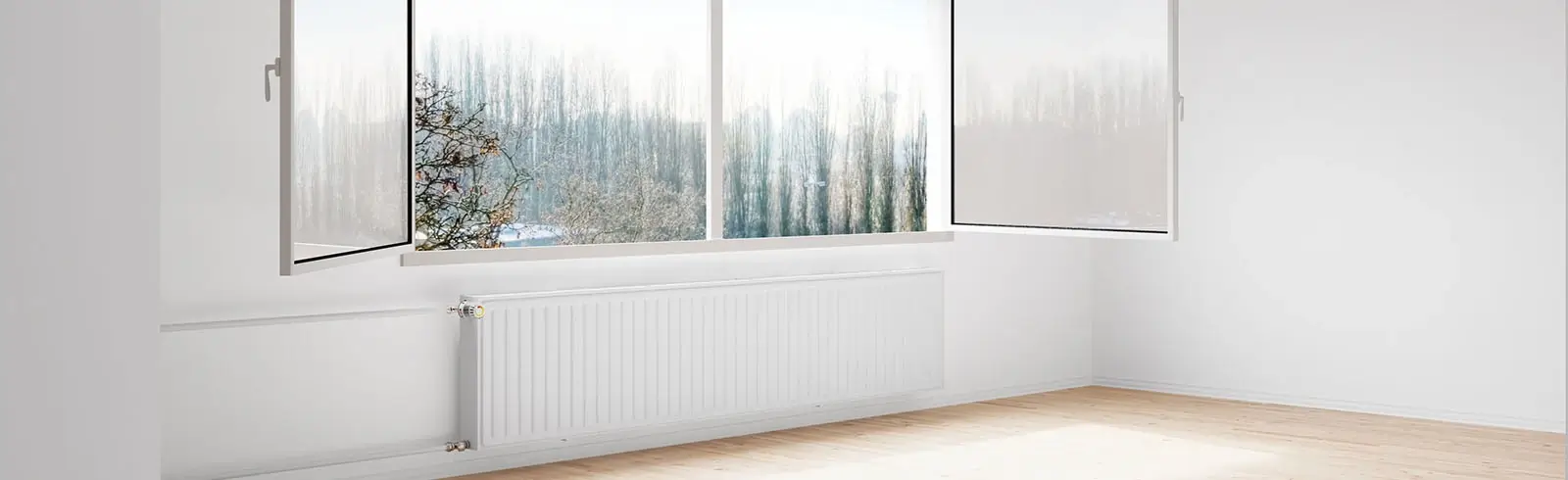 Ein weit geöffnetes Fenster bei hochgedrehter Heizung